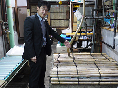 佐々木晃社長と佐々木酒造の井戸