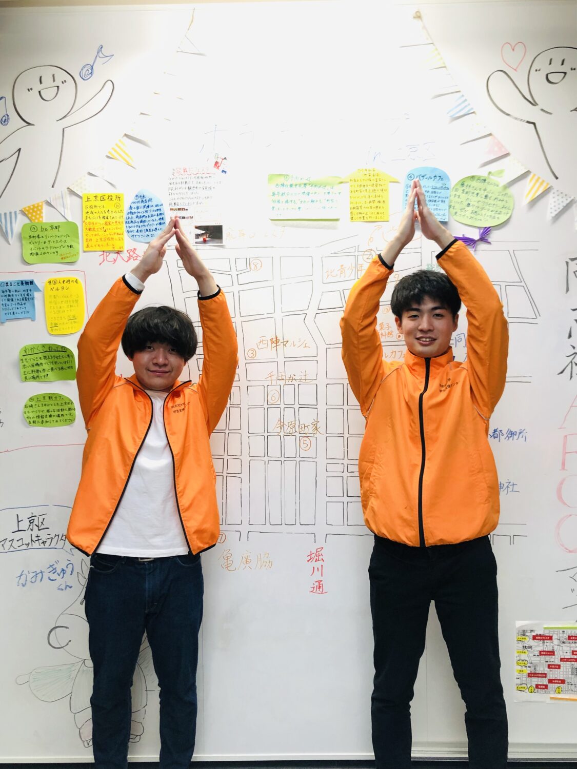 同志社大学ボランティア支援室<br />
学生スタッフARCO<br />
地域班（2021年度当時）<br />
益田　雪景（写真左）<br />
勝部　育（写真右）、関本　直樹